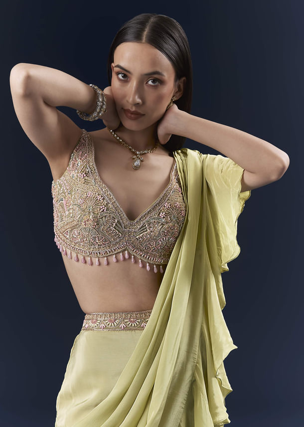 Green Crepe Ready Pleated Saree With Intricate Embroidery Green Crepe Ready Pleated Saree With Intricate Embroidery