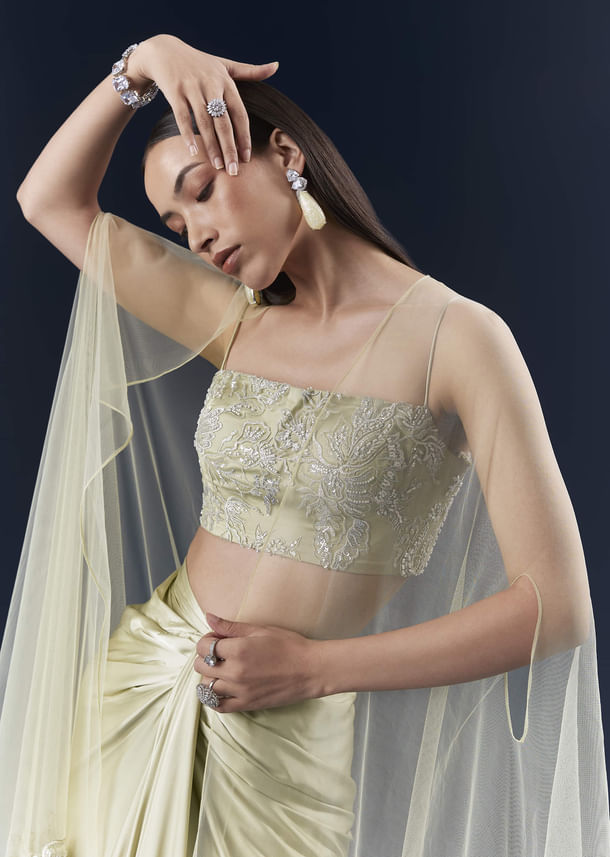 Green Satin Crop Top And Drape Skirt Set With Lace Work