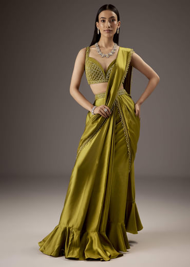 Green Silk Saree With Elegant Bead Work And Frills