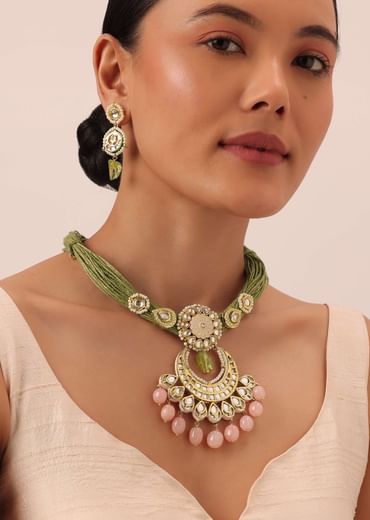Green Kundan Pendant Necklace Set With Pink Bead Drops And Crescent Moon Motif
