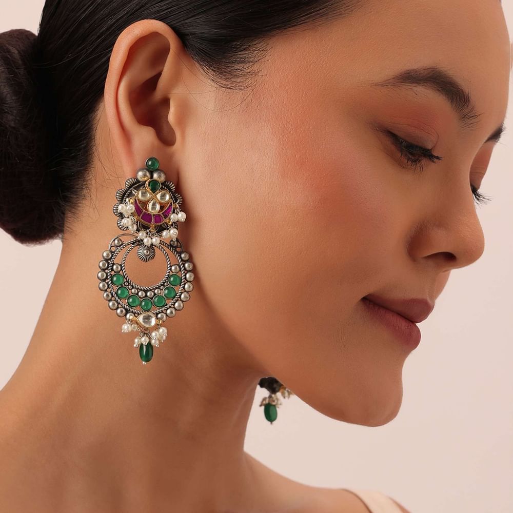 Green Oxidsed Earrings With Meenakari Detail And Floral Top