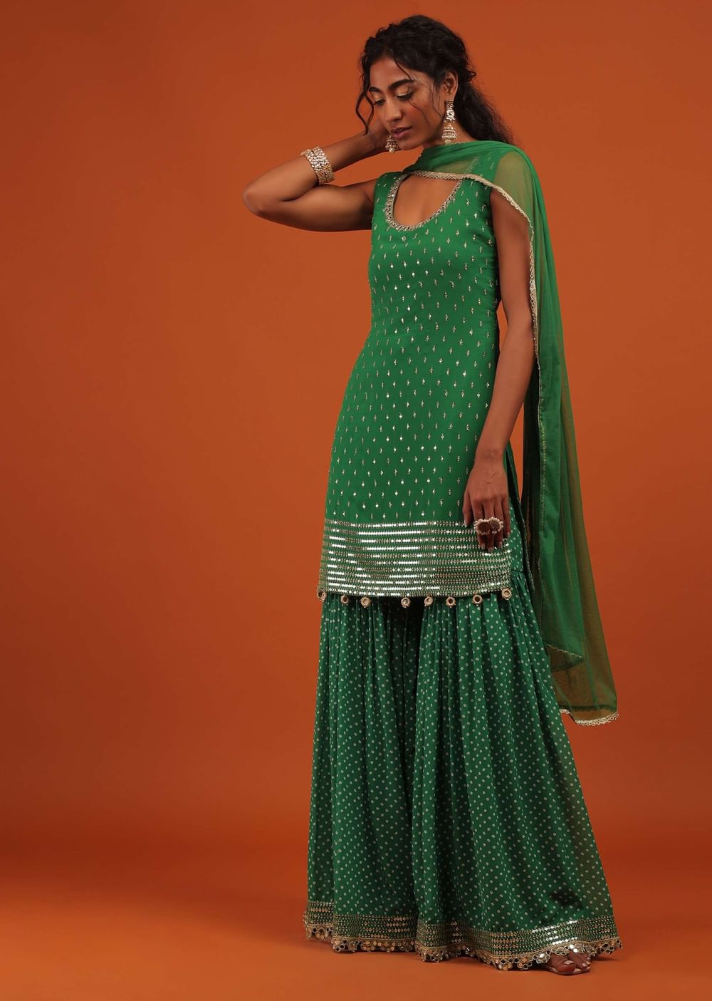 Green Sharara Suit In Georgette With A Net Dupatta