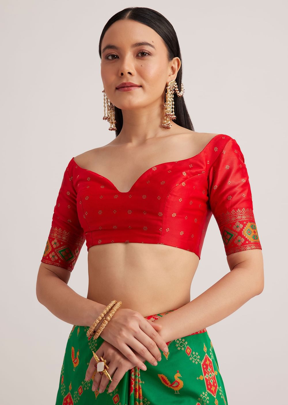 Green Silk Woven Ikat Motif Saree With Constrat Pallu