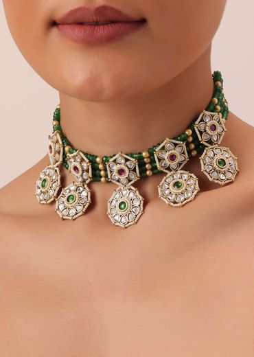 Green Temple Choker Set With Floral Motifs And Meenakari Detail