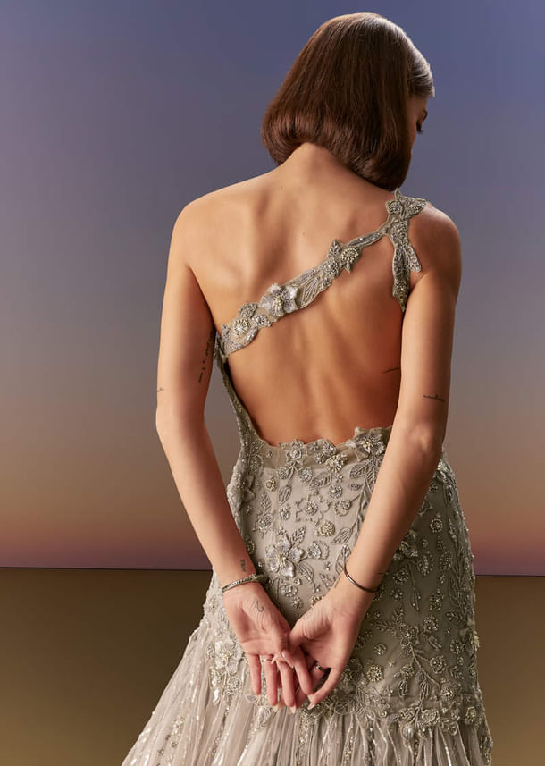 Grey Backless Gown With One Shoulder Bodice And Sculpted Fit Grey Backless Gown With One Shoulder Bodice And Sculpted Fit