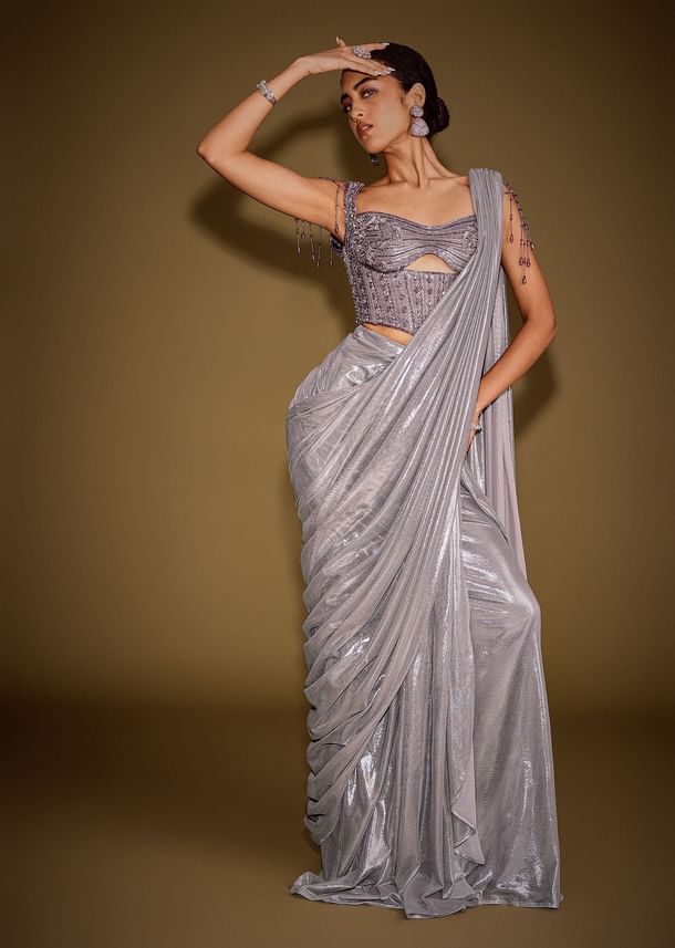 Grey Embellished Corset Blouse With Draped Saree And Tassel Detailing Grey Embellished Corset Blouse With Draped Saree And Tassel Detailing