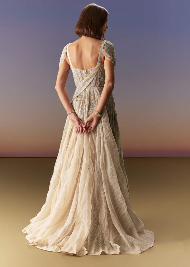 Grey Gown With Draped Cap Sleeves And Flowing Embroidered Flare Grey Gown With Draped Cap Sleeves And Flowing Embroidered Flare