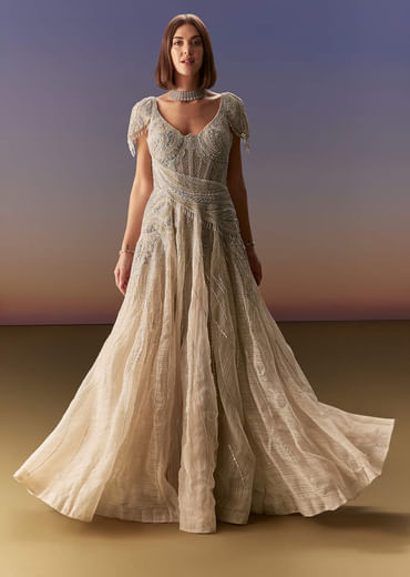 Grey Gown With Draped Cap Sleeves And Flowing Embroidered Flare
