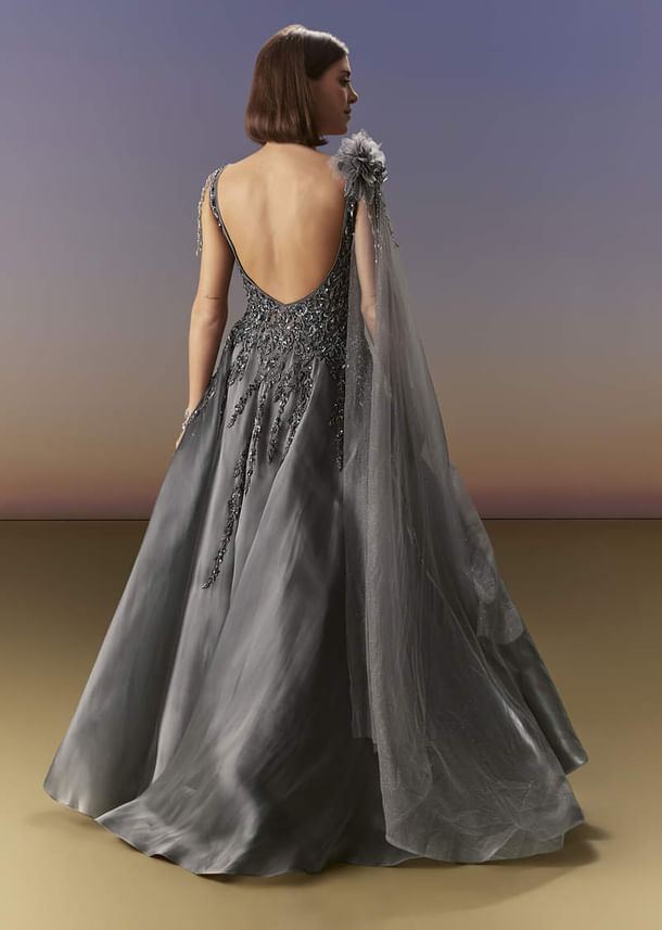 Grey Sleeveless Gown With Soft Net Trail And Shimmer Grey Sleeveless Gown With Soft Net Trail And Shimmer