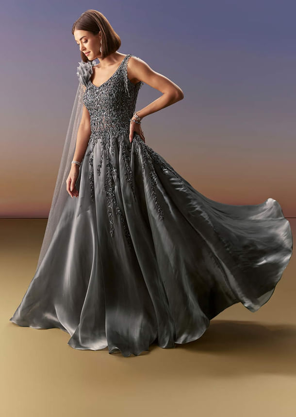Grey Sleeveless Gown With Soft Net Trail And Shimmer Grey Sleeveless Gown With Soft Net Trail And Shimmer