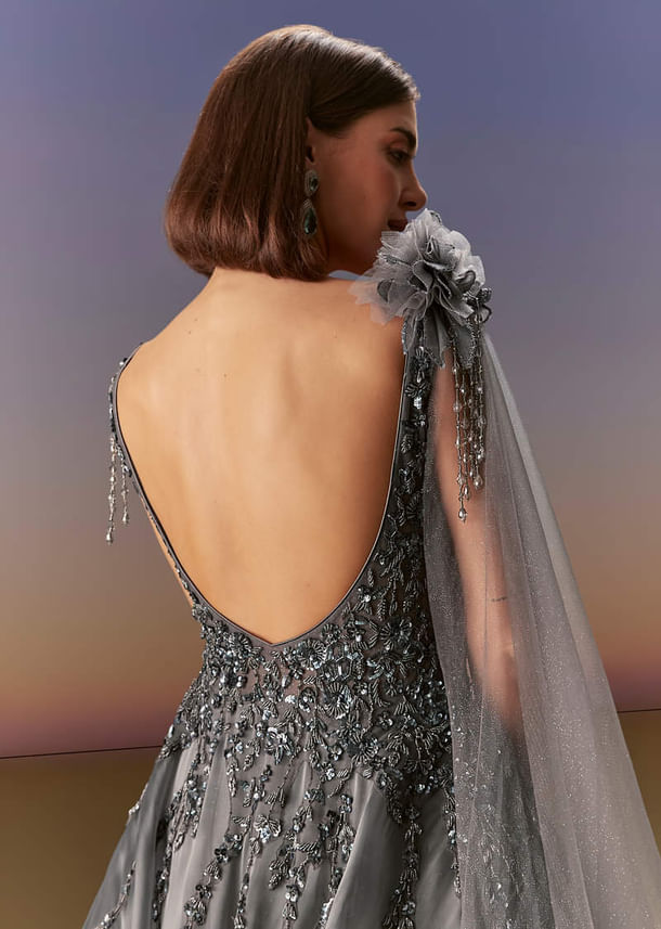 Grey Sleeveless Gown With Soft Net Trail And Shimmer Grey Sleeveless Gown With Soft Net Trail And Shimmer