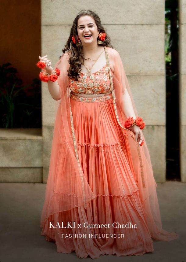 Coral Tiered Skirt And Crop Top With Cutdana Embellished Floral Blossoms And Ruffle Dupatta