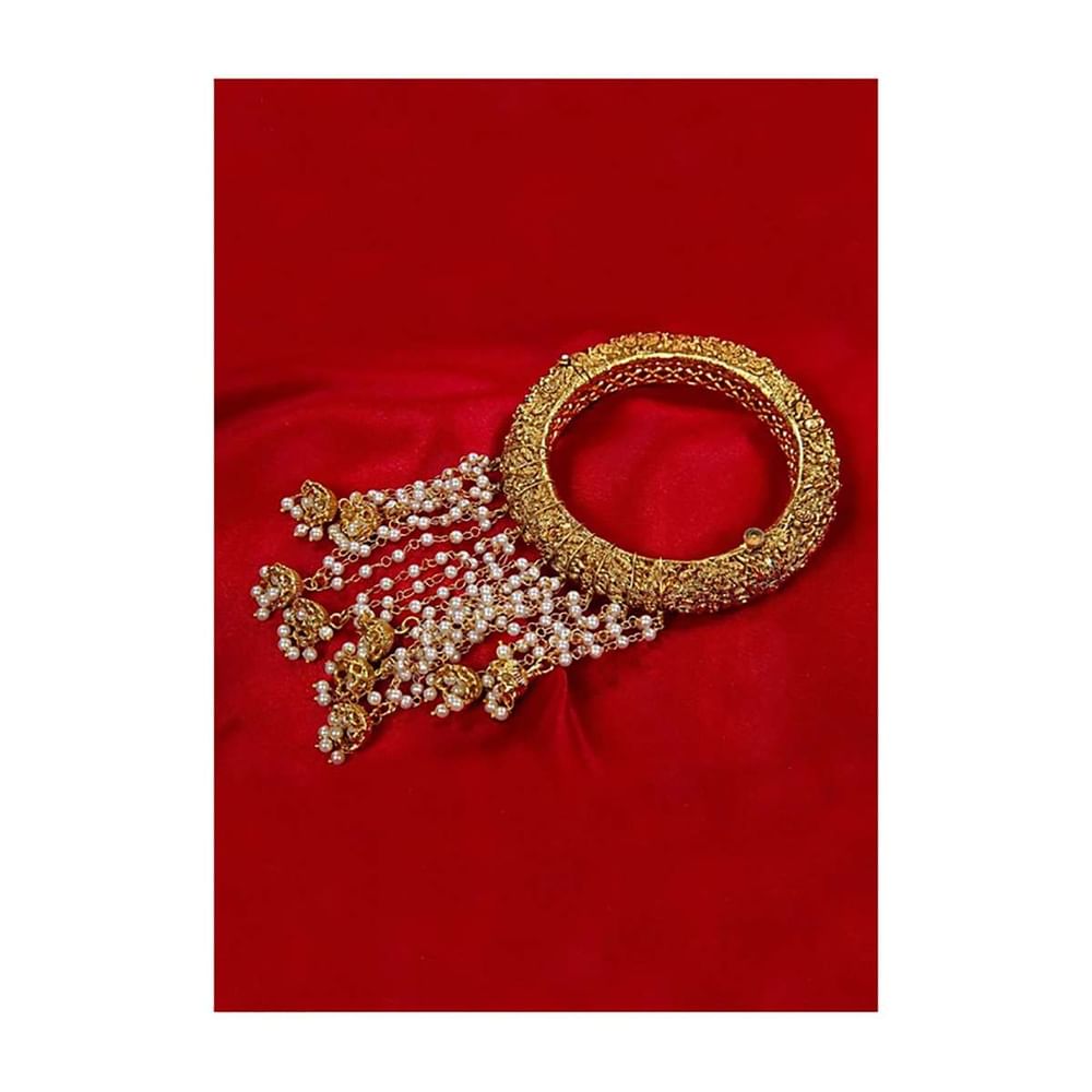 Heavy metal coated shiny golden kada with multi layer nano moti strings with jhumkas only on Kalki