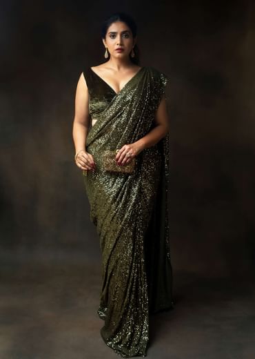 Henna Green Ready Pleated Saree Embellished In Sequins With A Matching Velvet Blouse With Plunging Neckline