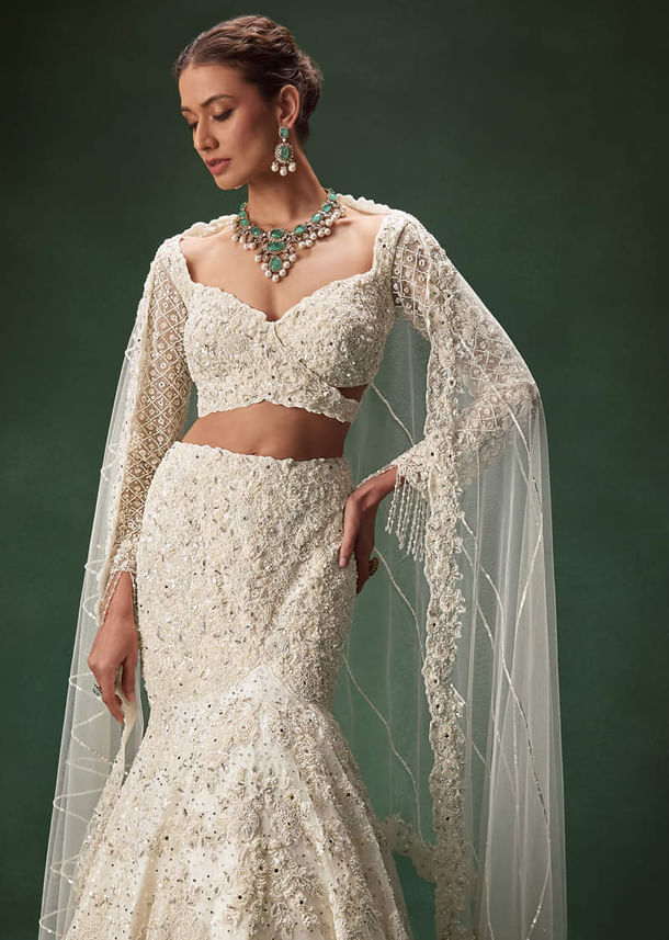 Ivory Mermaid Bridal Lehenga With Full Sleeves And Heavy Embroidery
