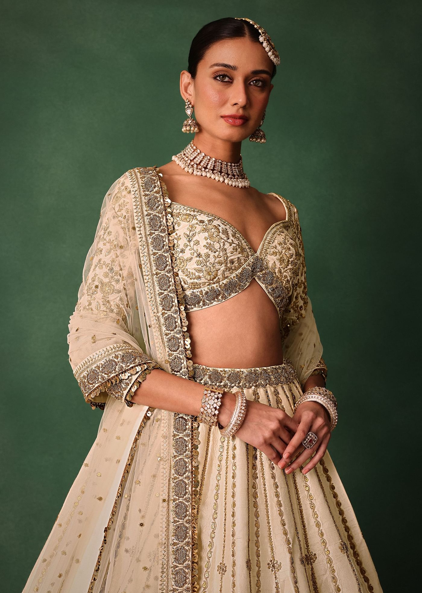 Ivory Raw Silk Hand Embroidered Lehenga Set With Net Dupatta