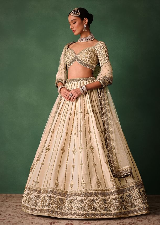 Ivory Raw Silk Hand Embroidered Lehenga Set With Net Dupatta