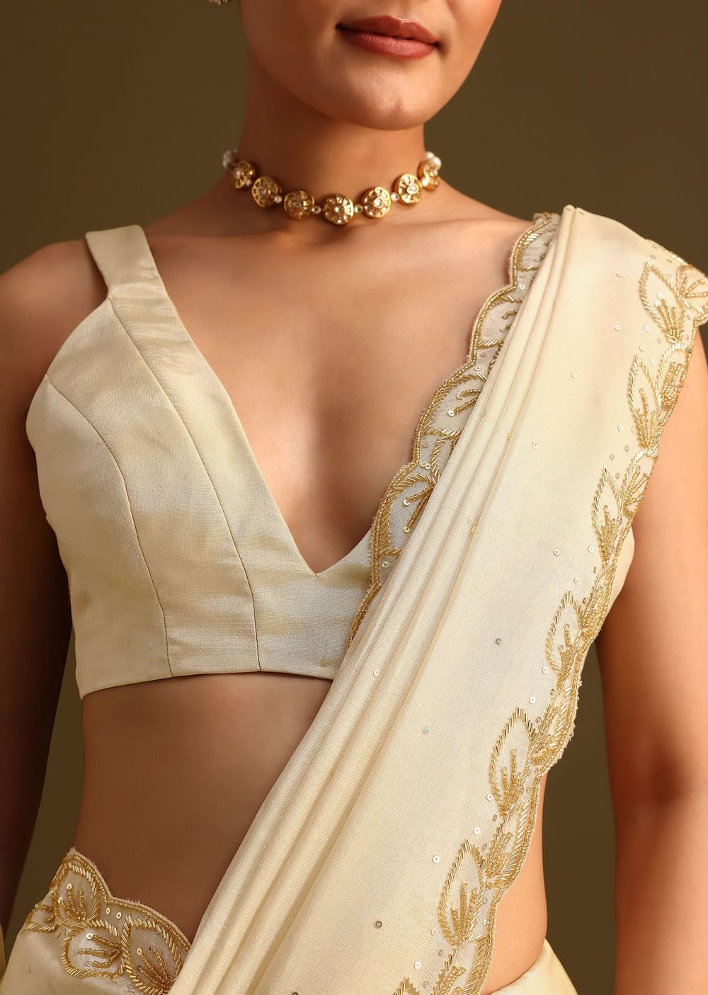Ivory Tissue Saree With Cutdana Embroidered Border and Unstitched Blouse