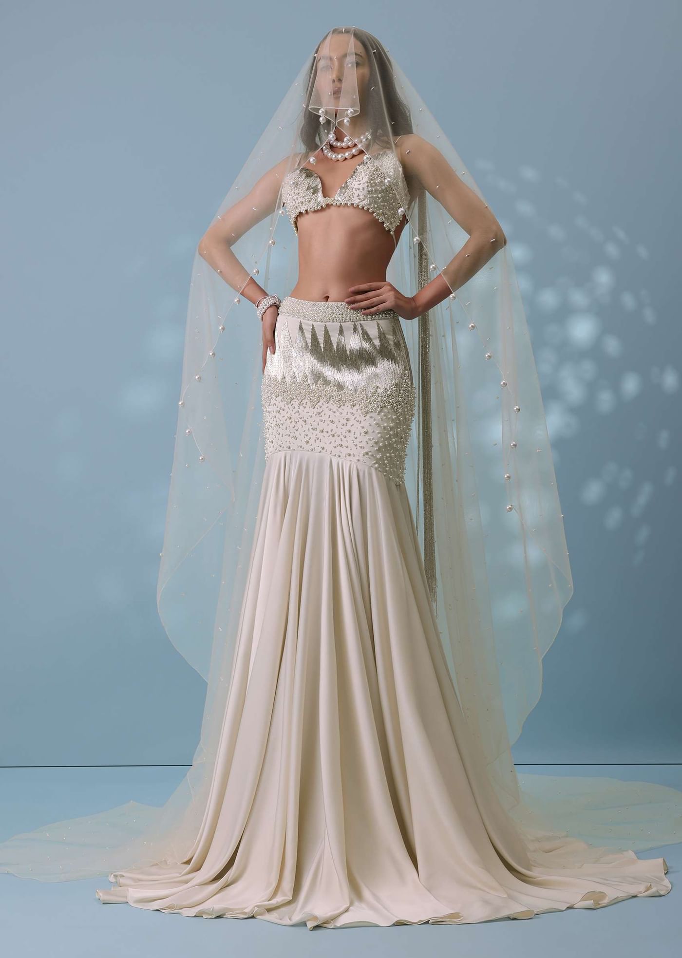 Ivory White Embroidered Trail Lehenga Set In Milano Satin With Tassel Blouse