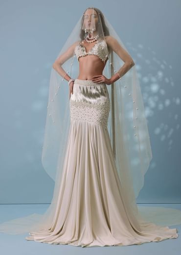 Ivory White Embroidered Trail Lehenga Set In Milano Satin With Tassel Blouse