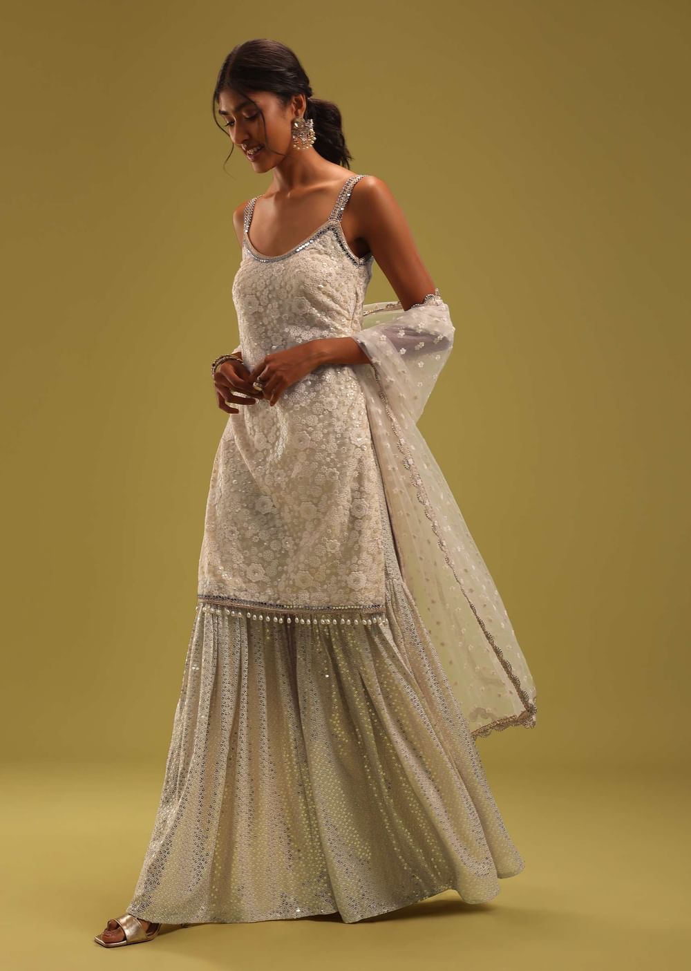 Ivory White Lucknowi Embroidered Net Kurti And Georgette Sharara Set