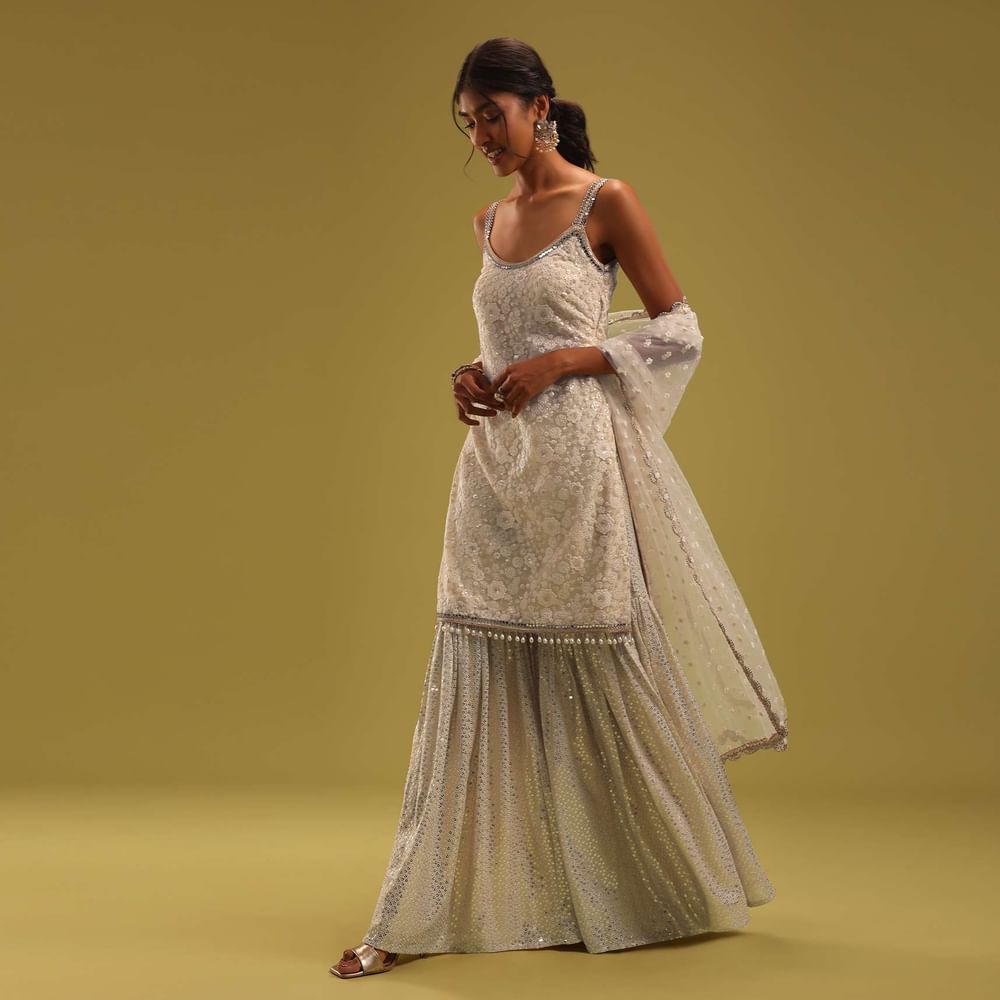 Ivory White Lucknowi Embroidered Net Kurti And Georgette Sharara Set
