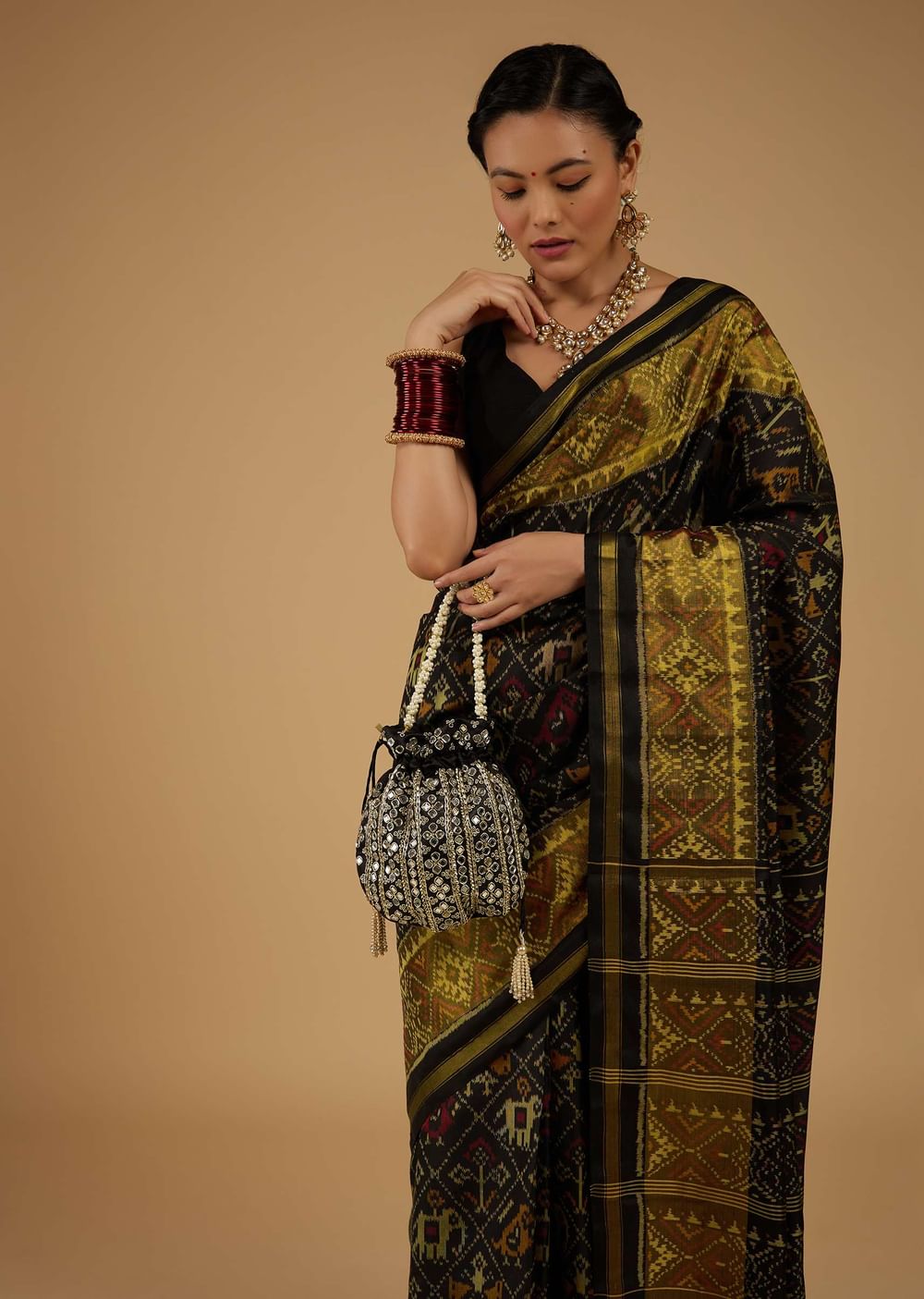 Bright Moss Green & Black Saree In Pure Silk Tissue With Ikat Weave & Zari Patola Work