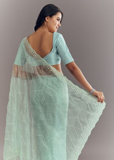 Light Blue Glass Tissue Saree With Stone Embroidery And Scallop Border