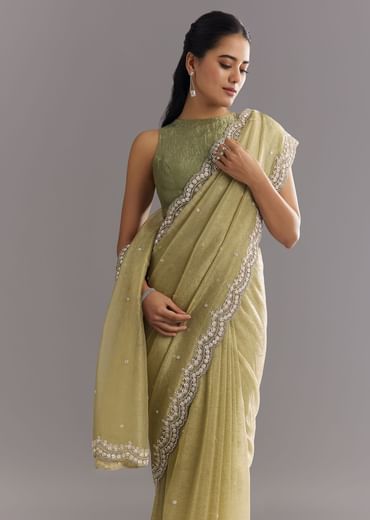 Light Green Glossy Crushed Tissue Saree With Cutdana Sequins Embroidery And Scallop Border