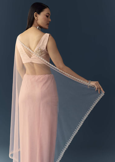 Light Pink Net Saree with Zigzag Cutwork and Unstitched Blouse