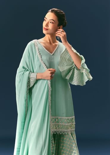 Light Blue Frill Sharara Suit With Tassel Dupatta