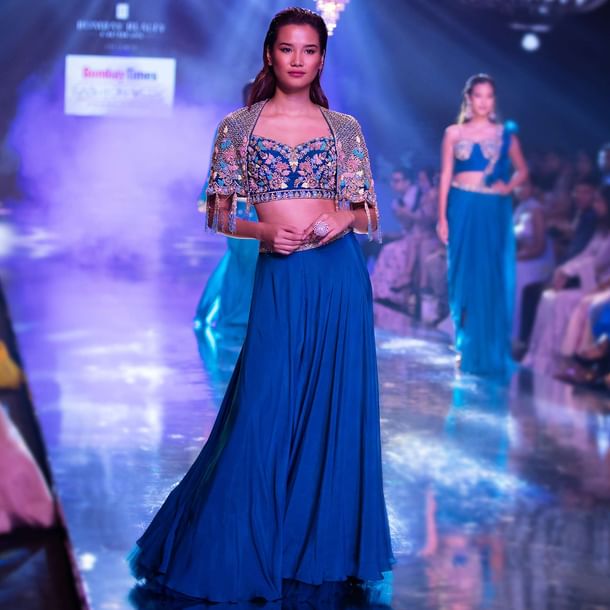Seaside Blue Crop Top And Palazzo With Embossed Embroidery And Hand Crafted Cape Seaside Blue Crop Top And Palazzo With Embossed Embroidery And Hand Crafted Cape