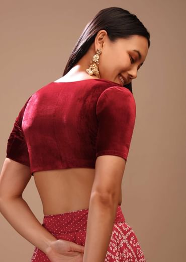 Maroon Blouse In Velvet With Leaf Cut Neckline And Half Sleeves
