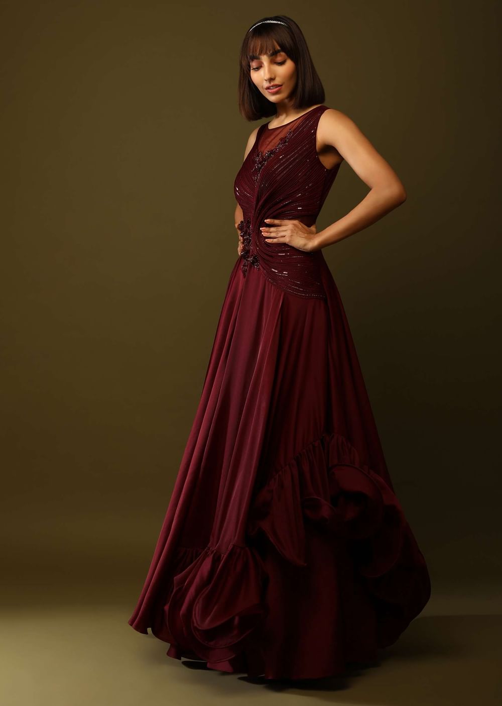 Maroon Gown With Ruched Bodice And Fancy Ruffled Hem