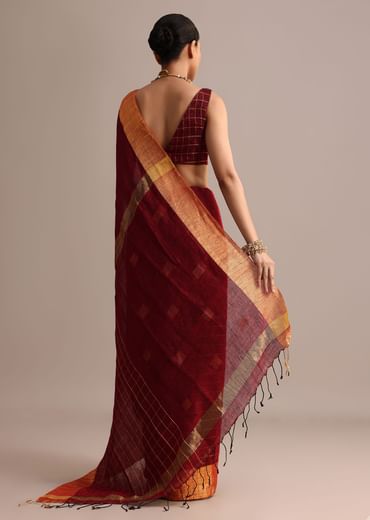 Maroon Linen Woven Saree With Zari Border And Unstitched Blouse