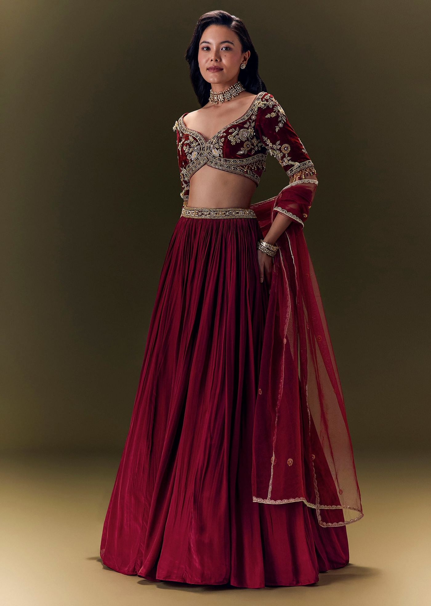 Maroon Pleated Skirt With Hand Embroidered Velvet Belt And Blouse With Net Dupatta