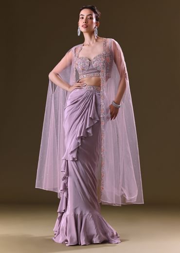 Mauve Ruffled Drape Skirt With Embroidered Blouse And Net Cape