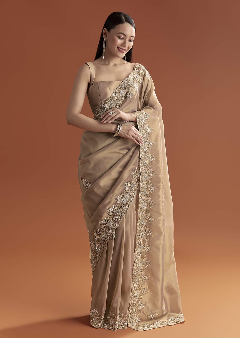 Mauve Tissue Saree With Scallop Border And Stone Embroidery