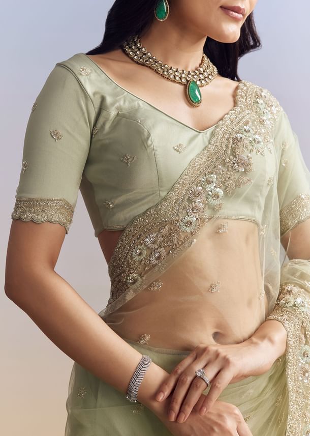 Mint Green Net Saree With Scallop Border And Heavy Embroidery
