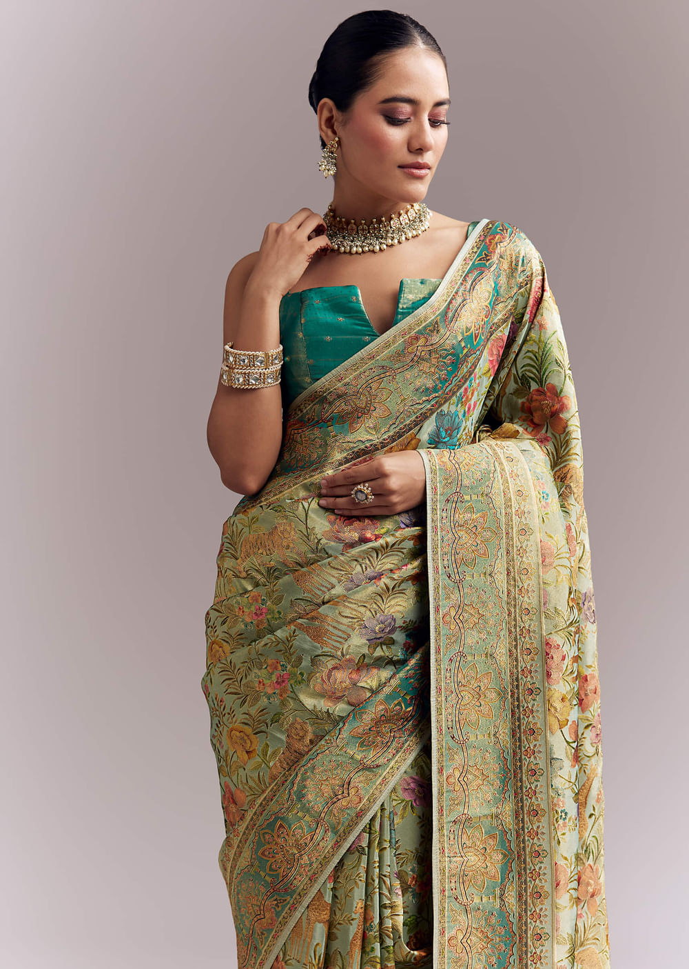 Mint Green Dola Silk Woven Saree With Embroidered Nature Motifs