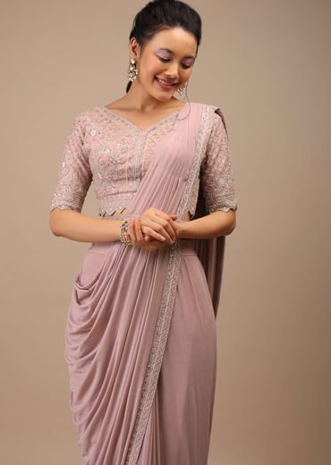 Misty Rose Pleated Saree In Lycra Blend Detailed With Embroidery Work On Pallu Border And Moroccan Jaal