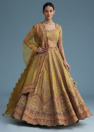 Mustard Crepe Lehenga Set With Floral Motif And Embroidery
