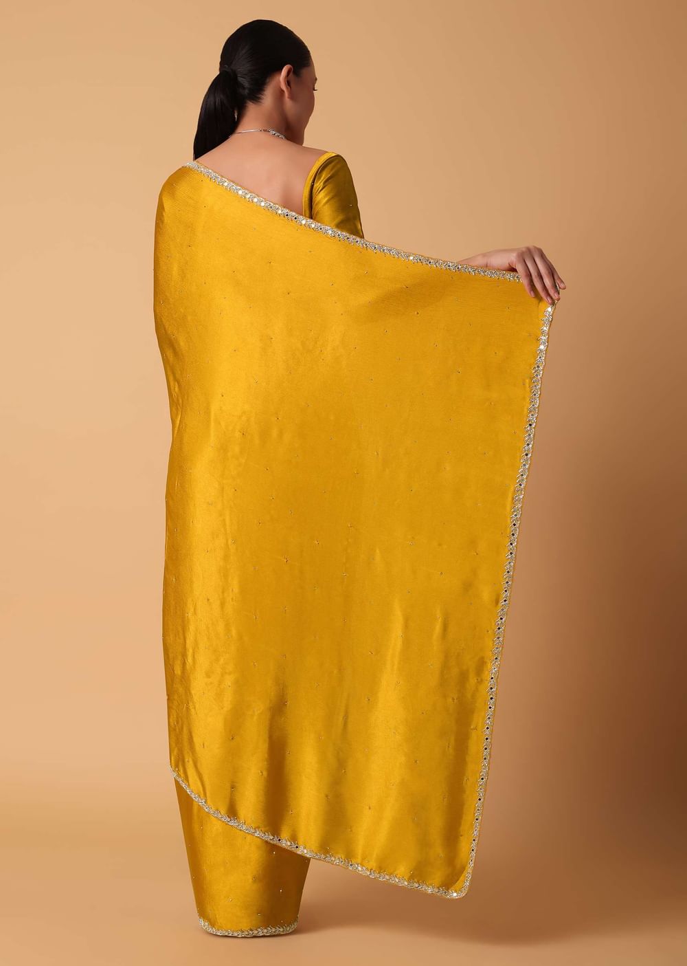 Mustard Satin Chinnon Saree With Mirror Detail Border And Unstitched Blouse Piece