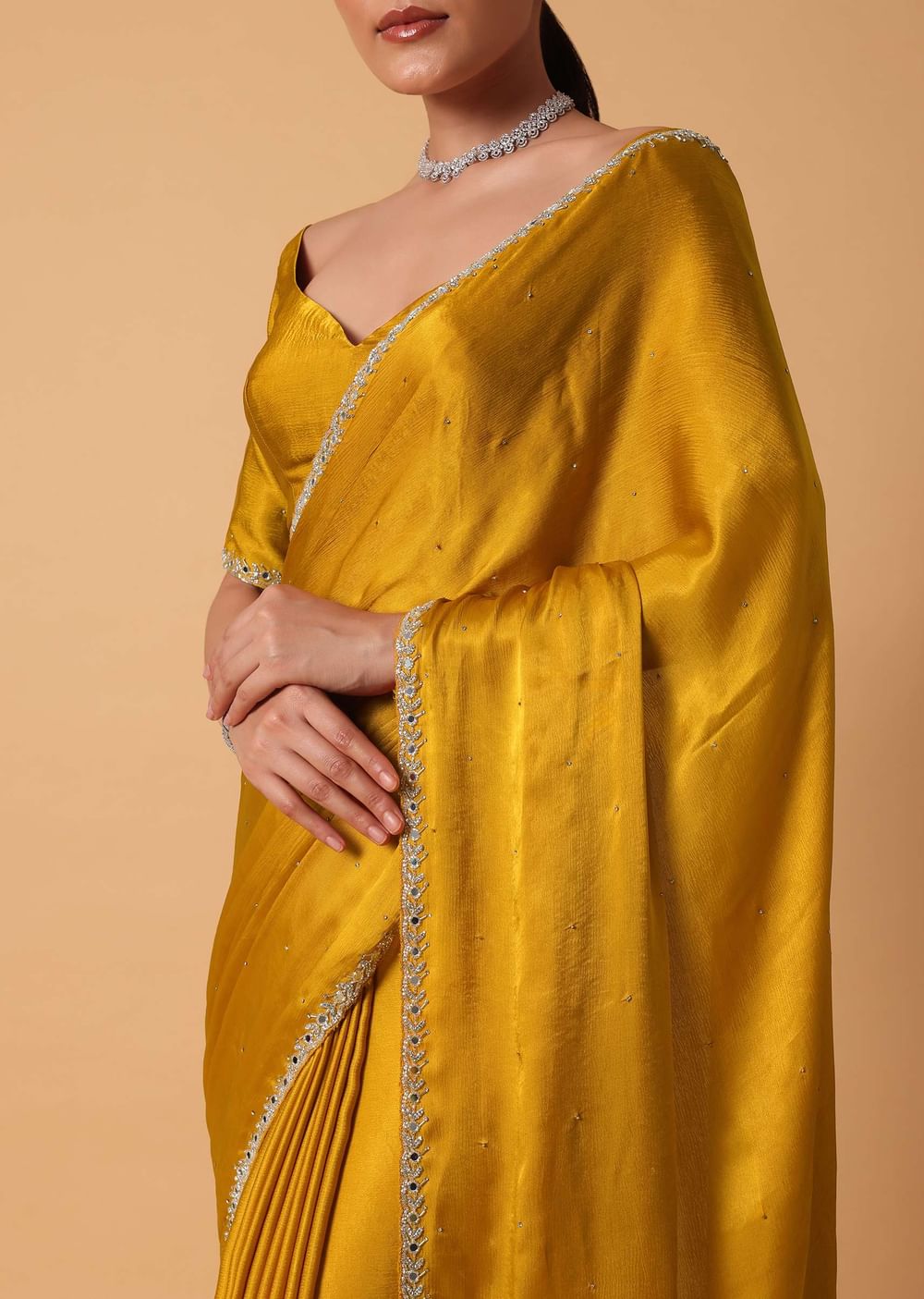 Mustard Satin Chinnon Saree With Mirror Detail Border And Unstitched Blouse Piece