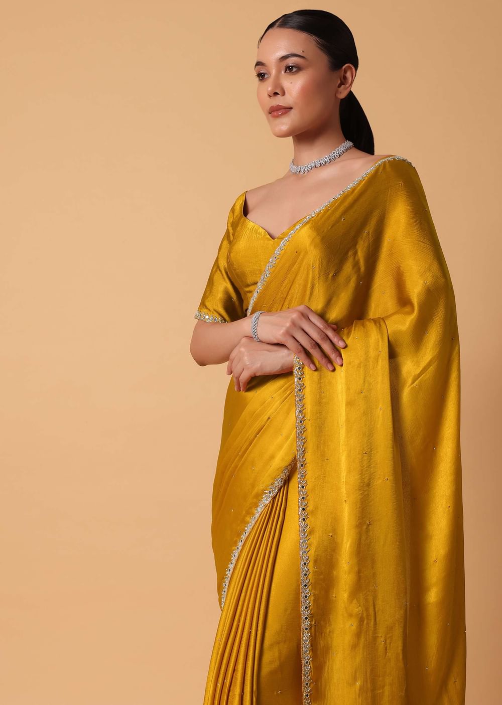 Mustard Satin Chinnon Saree With Mirror Detail Border And Unstitched Blouse Piece