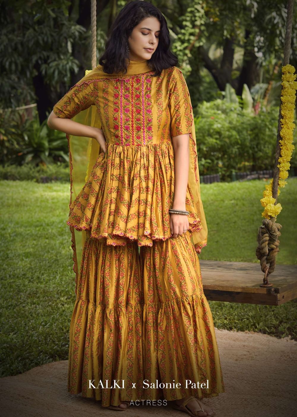 Mustard Sharara Suit In Cotton Blend With Peplum Kurti Adorned In Floral Print And Thread Embroidery
