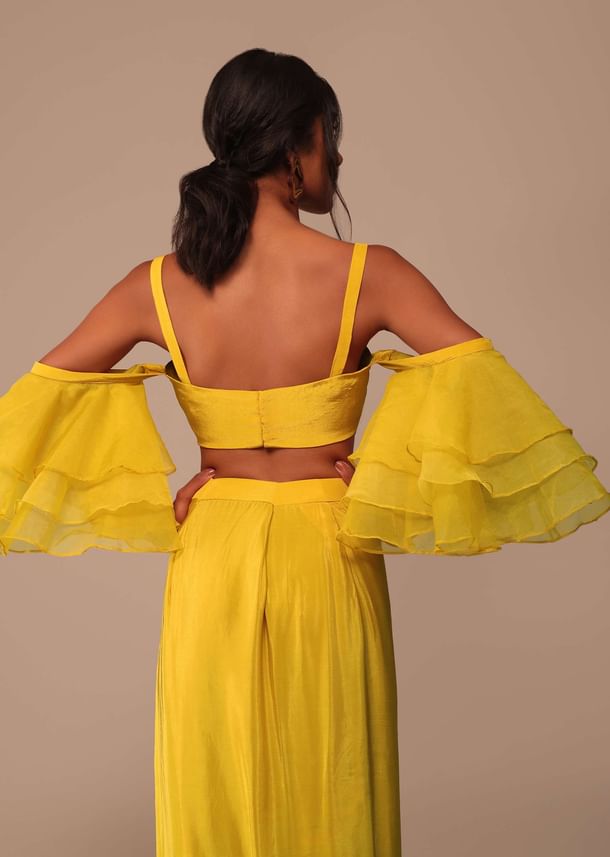 Mustard Yellow Crepe Saree With Ruffle Layered Blouse And Embroidered Belt Mustard Yellow Crepe Saree With Ruffle Layered Blouse And Embroidered Belt
