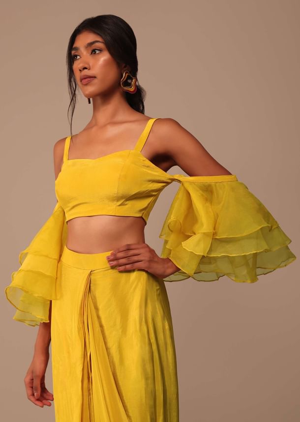 Mustard Yellow Crepe Saree With Ruffle Layered Blouse And Embroidered Belt Mustard Yellow Crepe Saree With Ruffle Layered Blouse And Embroidered Belt