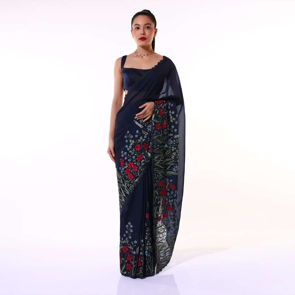 Navy Blue Saree In Organza Featuring Colorful Resham Embroidered Floral Design On The Border Paired With Unstitched Blouse Online - Kalki Fashion