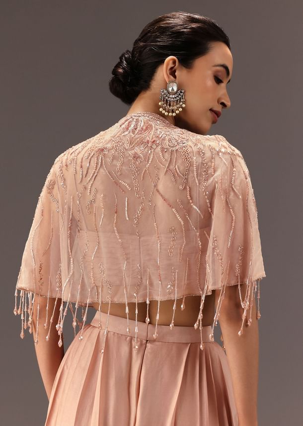 Nude Pleated Blouse With Tassel Cape And Dhoti Pants